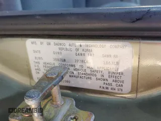 2006 Suzuki Forenza z VIN KL5JD56Z26K261080, wystawiony jako Copart lot #87112194 z przebiegiem 191 049 mil mil oraz Szkody całkowita. Historia ofert i sprzedaży dostępna na DreamBid. Obrazek 13.