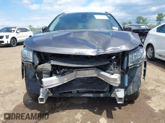 2018 Jeep Compass Latitude with VIN 3C4NJDBB5JT355582, listed as a IAAI auction lot 42351818 with 75,324 mi miles and . Bid and sale history available at DreamBid. Image 6.
