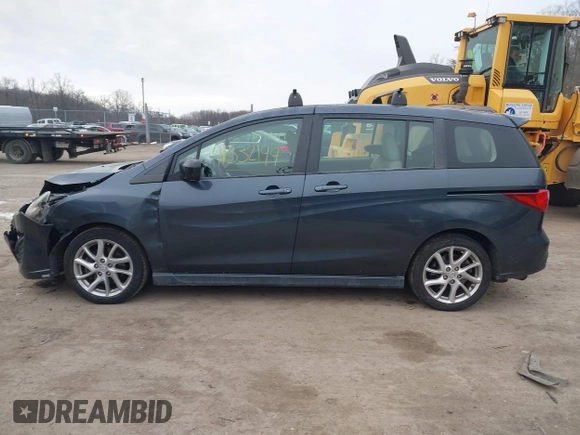 2012 Mazda 5 Touring with VIN JM1CW2CL6C0107233, listed as a IAAI auction lot 41332199 with 130,428 mi miles and . Bid and sale history available at DreamBid. Image 14.