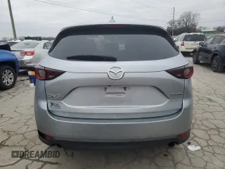2020 Mazda CX-5 Touring z VIN JM3KFBCM2L0768348, wystawiony jako Copart lot #87813065 z przebiegiem Nie podano mil oraz Szkoda całkowita • Salvage title. Historia ofert i sprzedaży dostępna na DreamBid. Obrazek 6.