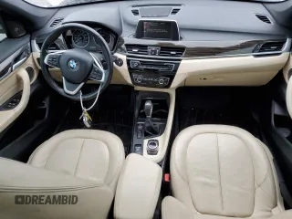 2017 BMW X1 sDrive28i with VIN WBXHU7C33H5H34013, listed as a Copart auction lot 38409444 with 87,558 mi miles and Salvage Title. Bid and sale history available at carsss.com. Image 8.