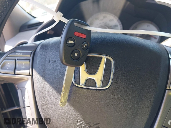 2010 Honda Pilot Touring with VIN 5FNYF3H84AB022700, listed as a IAAI auction lot 41689783 with 170,972 mi miles and . Bid and sale history available at DreamBid. Image 11.