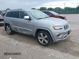 2015 Jeep Grand Cherokee Overland z VIN 1C4RJFCG5FC712365, wystawiony jako IAAI lot #42224958 z przebiegiem 77 458 mil mil oraz . Historia ofert i sprzedaży dostępna na DreamBid. Obrazek 1.
