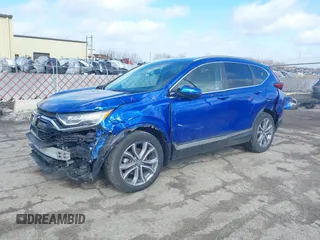 2020 Honda CR-V Touring with VIN 7FARW2H91LE012284, listed as a IAAI auction lot 41672460 with 28,207 mi miles and . Bid and sale history available at DreamBid. Image 2.