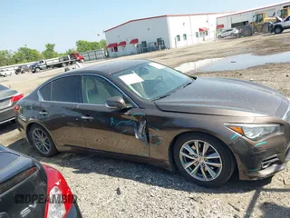 2014 Infiniti Q50 Hybrid Premium with VIN JN1AV7AP7EM691329, listed as a IAAI auction lot 41858913 with 144,688 mi miles and . Bid and sale history available at DreamBid. Image 13.