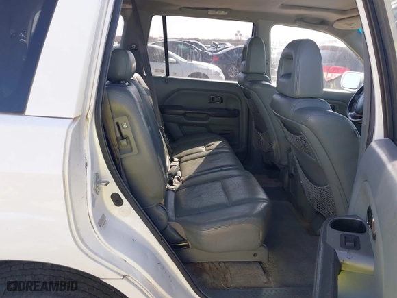 2005 Honda Pilot EX-L with NAVI with VIN 2HKYF18775H571312, listed as a IAAI auction lot 41830609 with 297,923 mi miles. Bid and sale history available at carsss.com. Image 8.