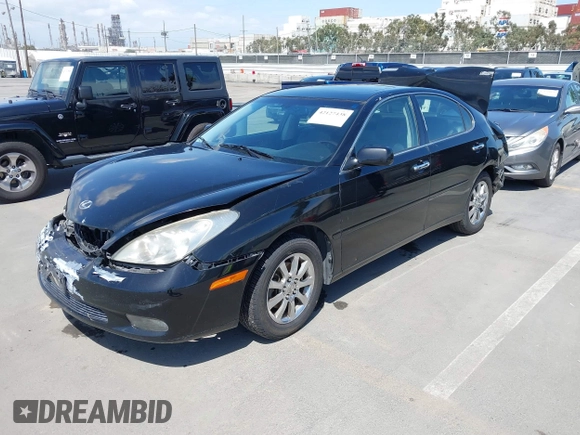 2002 Lexus ES 300 with VIN JTHBF30G720015358, listed as a IAAI auction lot 42127438 with 188,969 mi miles. Bid and sale history available at carsss.com. Image 2.
