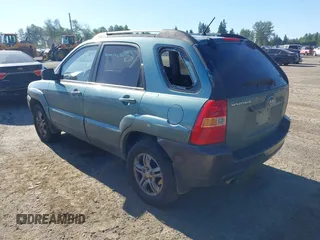 2006 Kia Sportage LX with VIN KNDJE723667170725, listed as a IAAI auction lot 42347100 with 153,002 mi miles and . Bid and sale history available at DreamBid. Image 3.