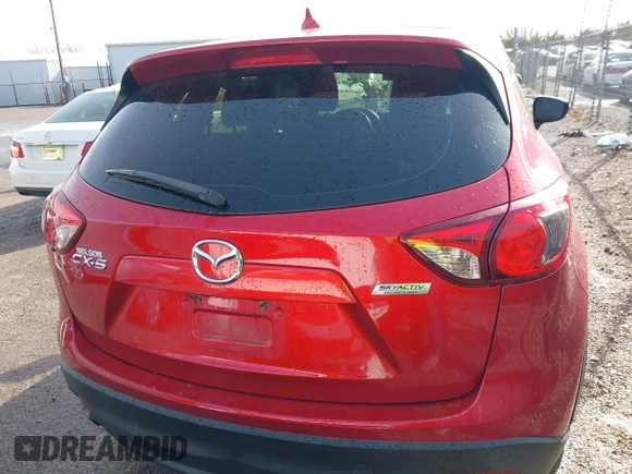 2016 Mazda CX-5 Sport with VIN JM3KE2BY3G0754391, listed as a IAAI auction lot 41719461 with 79,130 mi miles. Bid and sale history available at carsss.com. Image 16.