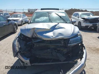 2019 Volkswagen Tiguan SEL Premium with VIN 3VV4B7AX5KM085435, listed as a IAAI auction lot 41839386 with 124,501 mi miles and . Bid and sale history available at DreamBid. Image 12.