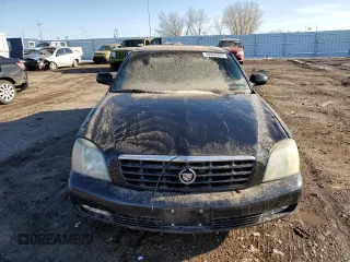2004 Cadillac DeVille DTS z VIN 1G6KF57944U253624, wystawiony jako Copart lot #49444905 z przebiegiem 174 823 mil mil oraz Szkoda całkowita • Salvage title. Historia ofert i sprzedaży dostępna na DreamBid. Obrazek 5.