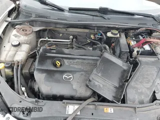 2006 Mazda 3 i Touring with VIN JM1BK12F961462392, listed as a IAAI auction lot 41322168 with 127,511 mi miles and . Bid and sale history available at DreamBid. Image 10.