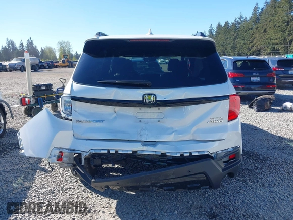 2023 Honda Passport Elite with VIN 5FNYF8H01PB004087, listed as a IAAI auction lot 42045433 with 20,677 mi miles and . Bid and sale history available at DreamBid. Image 16.