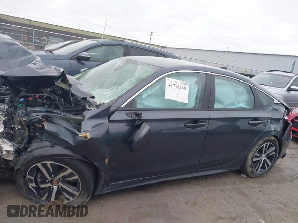 2024 Honda Civic LX z VIN 19XFL2H5XRE023870, wystawiony jako IAAI lot #41776260 z przebiegiem Nie podano mil oraz . Historia ofert i sprzedaży dostępna na DreamBid. Obrazek 13.