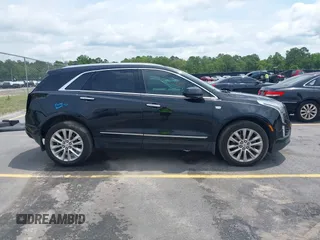 2017 Cadillac XT5 Platinum AWD z VIN 1GYKNFRS9HZ125677, wystawiony jako IAAI lot #42366784 z przebiegiem 152 116 mil mil oraz . Historia ofert i sprzedaży dostępna na DreamBid. Obrazek 14.
