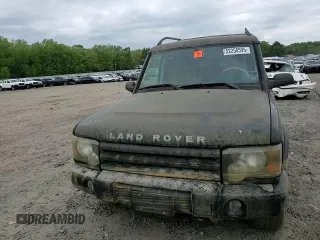 2003 Land Rover Discovery SE z VIN SALTW16463A823650, wystawiony jako Copart lot #52258595 z przebiegiem 194 038 mil mil oraz Szkoda całkowita • Salvage title. Historia ofert i sprzedaży dostępna na DreamBid. Obrazek 11.