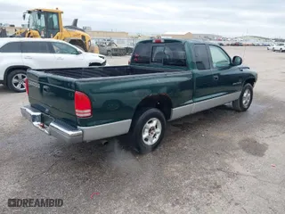 1998 Dodge Dakota SLT with VIN 1B7GL22Y8WS722611, listed as a IAAI auction lot 40964684 with 213,429 mi miles. Bid and sale history available at carsss.com. Image 4.