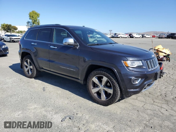 2015 Jeep Grand Cherokee Overland with VIN 1C4RJFCM3FC887817, listed as a Copart auction lot 57420185 with 145,971 mi miles and Clean title. Bid and sale history available at DreamBid. Image 4.