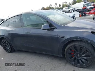2022 Tesla Model Y Performance with VIN 7SAYGDEF7NF563433, listed as a IAAI auction lot 41713557 with Not Provided miles and . Bid and sale history available at DreamBid. Image 12.