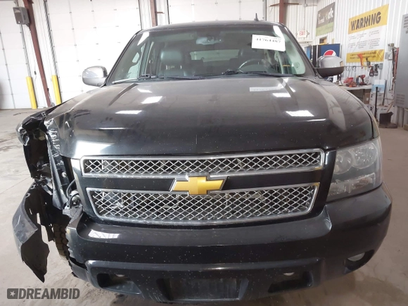2012 Chevrolet Suburban LTZ with VIN 1GNSKKE77CR326924, listed as a IAAI auction lot 41764487 with 198,224 mi miles. Bid and sale history available at carsss.com. Image 13.