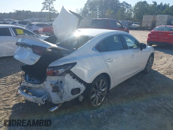 2020 Mazda 6 Signature with VIN JM1GL1XY0L1515151, listed as a IAAI auction lot 41499318 with 46,474 mi miles and . Bid and sale history available at DreamBid. Image 4.