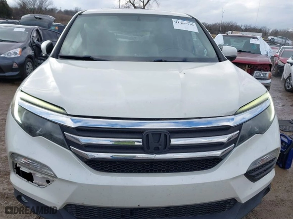 2016 Honda Pilot EX-L with VIN 5FNYF6H54GB057429, listed as a IAAI auction lot 41469310 with 107,288 mi miles. Bid and sale history available at carsss.com. Image 12.