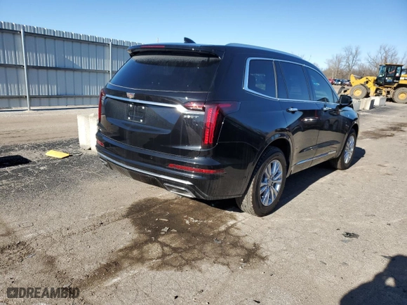 2023 Cadillac XT6 Luxury with VIN 1GYKPBR45PZ170389, listed as a Copart auction lot 80903903 with 5,615 mi miles. Bid and sale history available at carsss.com. Image 3.