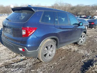 2019 Honda Passport EX-L with VIN 5FNYF7H50KB012132, listed as a IAAI auction lot 41327682 with 56,653 mi miles and . Bid and sale history available at carsss.com. Image 4.