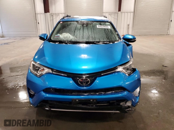 2018 Toyota RAV4 XLE with VIN JTMRFREV3JJ748218, listed as a Copart auction lot 44839665 with 74,791 mi miles and Salvage Title. Bid and sale history available at DreamBid. Image 5.