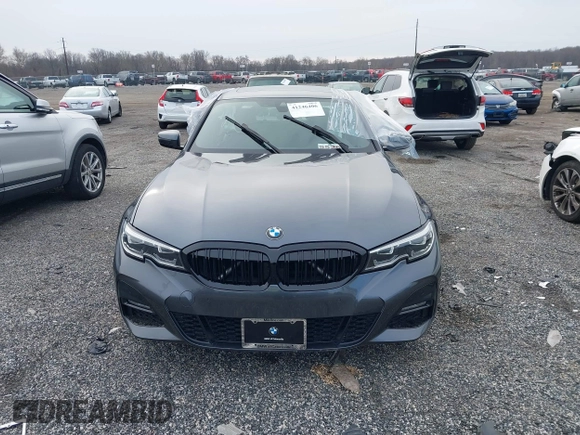 2019 BMW 3 Series 330i xDrive with VIN WBA5R7C54KFH24284, listed as a IAAI auction lot 41246406 with 57,200 mi miles. Bid and sale history available at carsss.com. Image 12.