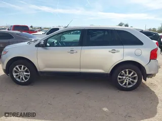 2013 Ford Edge SEL with VIN 2FMDK4JC2DBE33878, listed as a IAAI auction lot 41597848 with 216,761 mi miles. Bid and sale history available at carsss.com. Image 14.