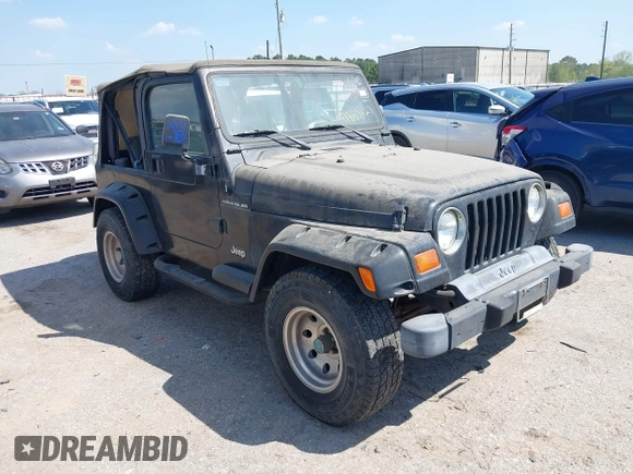 1998 Jeep Wrangler SE with VIN 1J4FY29P1WP806244, listed as a IAAI auction lot 41885627 with 131,486 mi miles. Bid and sale history available at carsss.com. Image 1.