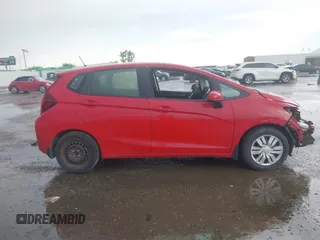 2016 Honda Fit LX z VIN JHMGK5H58GS011783, wystawiony jako IAAI lot #42194425 z przebiegiem Nie podano mil oraz . Historia ofert i sprzedaży dostępna na DreamBid. Obrazek 13.