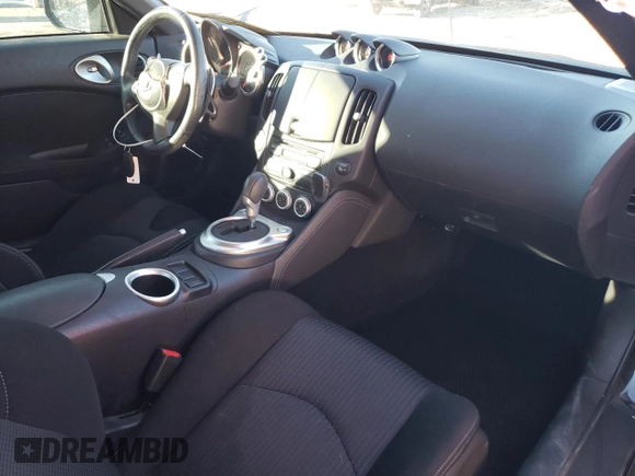 2014 Nissan 370Z Nismo z VIN JN1AZ4EHXEM632166, wystawiony jako Copart lot #88311915 z przebiegiem 18 414 mil mil oraz Szkoda całkowita • Salvage title. Historia ofert i sprzedaży dostępna na DreamBid. Obrazek 8.