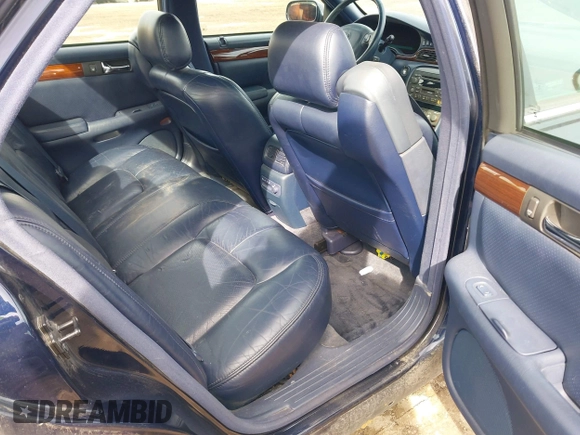 1999 Cadillac Seville Touring STS z VIN 1G6KY5493XU913994, wystawiony jako IAAI lot #41780695 z przebiegiem 60 375 mil mil oraz . Historia ofert i sprzedaży dostępna na DreamBid. Obrazek 8.