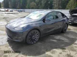 2024 Tesla Model Y Performance with VIN 7SAYGDEF1RF073706, listed as a Copart auction lot 51676945 with 9,717 mi miles and Salvage Title. Bid and sale history available at DreamBid. Image 1.