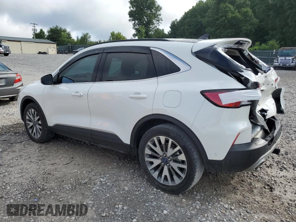 2020 Ford Escape Titanium with VIN 1FMCU9J91LUC38161, listed as a Copart auction lot 64293535 with 48,682 mi miles and Salvage title. Bid and sale history available at DreamBid. Image 2.