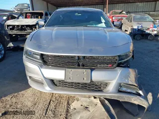 2016 Dodge Charger SXT with VIN 2C3CDXJG8GH281884, listed as a IAAI auction lot 41413437 with 115,548 mi miles. Bid and sale history available at carsss.com. Image 13.