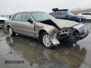 2005 Ford Crown Victoria LX z VIN 2FAFP74W05X122403, wystawiony jako Copart lot #45305825 z przebiegiem 202 381 mil mil oraz Szkoda całkowita • Salvage title. Historia ofert i sprzedaży dostępna na DreamBid. Obrazek 4.