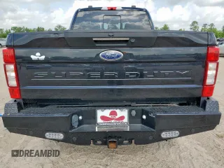 2021 Ford F-250 XL with VIN 1FT7W2BT6MEC47760, listed as a Copart auction lot 61908225 with 111,015 mi miles and Salvage title. Bid and sale history available at DreamBid. Image 6.