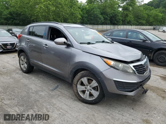 2012 Kia Sportage LX z VIN KNDPB3A20C7217165, wystawiony jako Copart lot #60999525 z przebiegiem 128 231 mil mil oraz Szkoda całkowita • Salvage title. Historia ofert i sprzedaży dostępna na DreamBid. Obrazek 4.