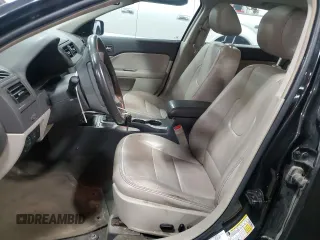 2012 Ford Fusion Hybrid с VIN 3FADP0L33CR231536, выставлен на аукционе Copart как лот 55330545 с пробегом 165 481 миль миль и Списание • Salvage title. История ставок и продаж доступна на DreamBid. Изображение 7.