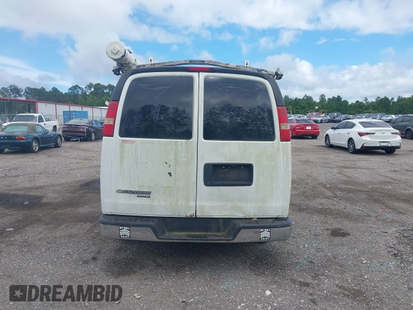 2014 Chevrolet Express Cargo with VIN 1GCSGAFX0E1110921, listed as a IAAI auction lot 42737205 with 177,631 mi miles and . Bid and sale history available at DreamBid. Image 16.