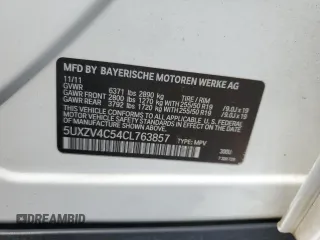 2012 BMW X5 35i with VIN 5UXZV4C54CL763857, listed as a Copart auction lot 57943195 with 143,522 mi miles and Salvage title. Bid and sale history available at DreamBid. Image 13.