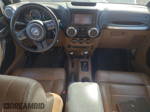 2012 Jeep Wrangler Unlimited Call of Duty MW3 с VIN 1C4BJWFG3CL103865, выставлен на аукционе Copart как лот 74237754 с пробегом 104 232 миль миль и Списание • Salvage title. История ставок и продаж доступна на DreamBid. Изображение 8.