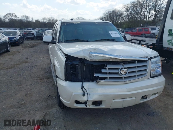 2005 Cadillac Escalade z VIN 1GYEC63T55R115387, wystawiony jako IAAI lot #41791855 z przebiegiem 165 246 mil mil oraz . Historia ofert i sprzedaży dostępna na DreamBid. Obrazek 6.
