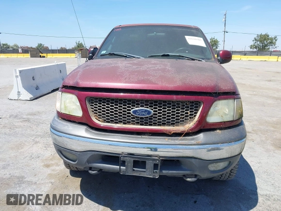 2003 Ford F-150 XLT with VIN 1FTRW08L63KA20475, listed as a IAAI auction lot 42610305 with Not provided miles and . Bid and sale history available at DreamBid. Image 12.
