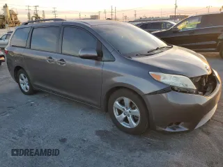 2015 Toyota Sienna LE AAS with VIN 5TDKK3DC8FS609769, listed as a Copart auction lot 87512475 with 140,536 mi miles and Salvage Title. Bid and sale history available at carsss.com. Image 4.