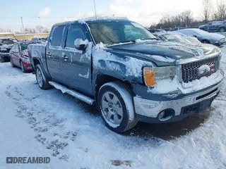 2010 GMC Sierra 1500 SLE with VIN 3GTRKVE36AG137197, listed as a IAAI auction lot 41211550 with 206,812 mi miles. Bid and sale history available at carsss.com. Image 1.