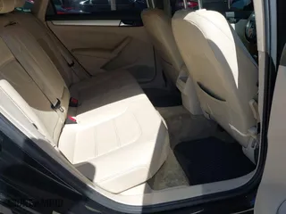 2012 Volkswagen Passat SE with VIN 1VWBP7A30CC025468, listed as a IAAI auction lot 41817638 with 204,508 mi miles. Bid and sale history available at carsss.com. Image 8.